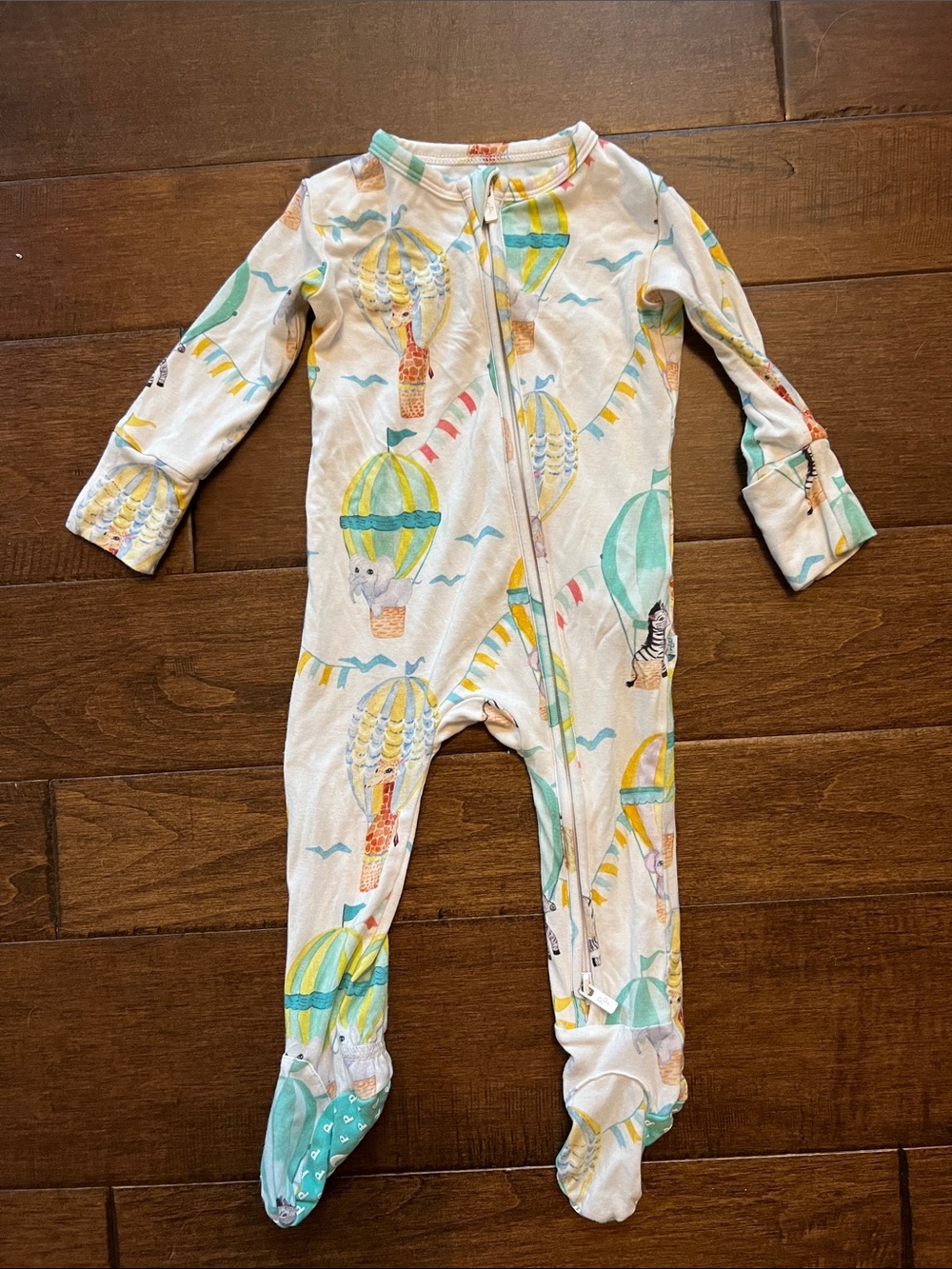 Posh Peanut Cream Footed Pajamas with Mint and Yellow Hot Air Balloon Print